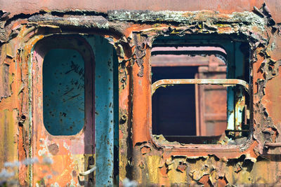 Old rusty metal door of abandoned train