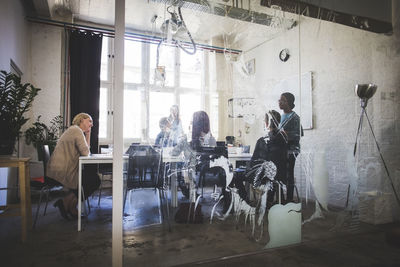 Business people in board room during brainstorming session