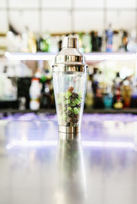 Close-up of cocktail in glass on table