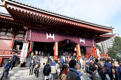 Group of people in front of building