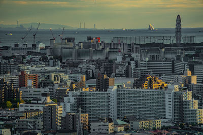 High angle view of city at sunset