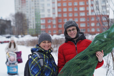 Portrait of woman standing in warm clothing