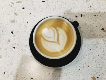 High angle view of cappuccino on table