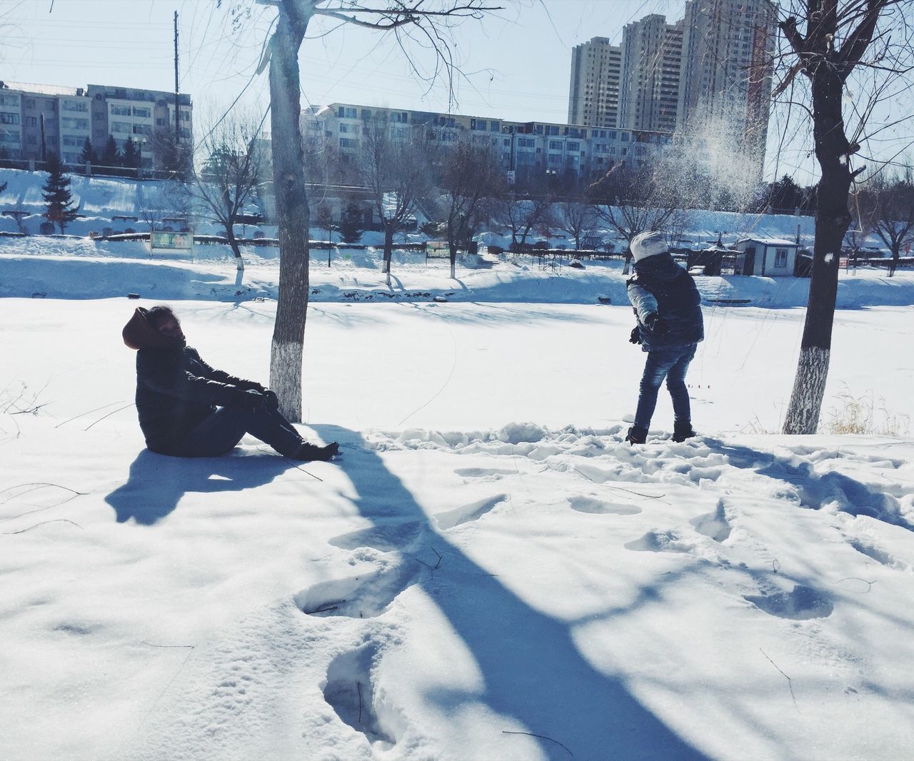 winter, snow, cold temperature, weather, city, day, outdoors, winter sport, frozen, warm clothing, people, adults only, adult, human body part, ice rink