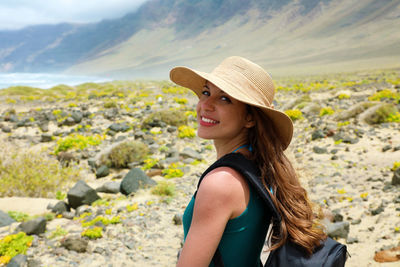 Portrait of beautiful woman in hat