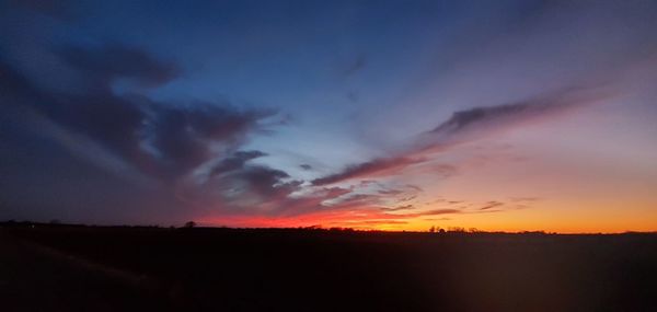 Scenic view of dramatic sky during sunset