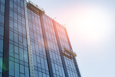 Low angle view of modern building against clear sky