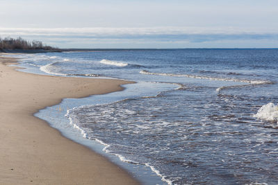 Scenic view of beach against sky