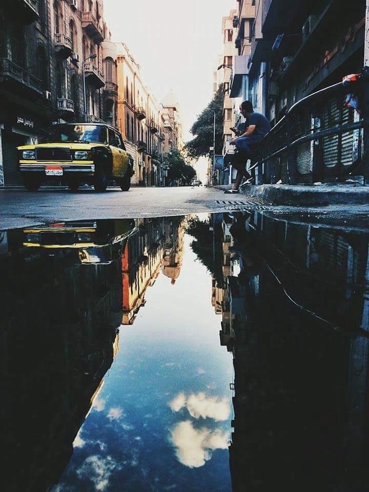 reflection, water, building exterior, architecture, built structure, city, waterfront, canal, outdoors, sky, sunset, nautical vessel, no people, nature, day, gondola - traditional boat