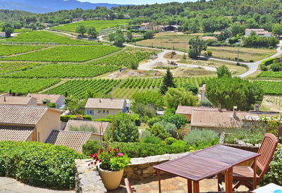 Table in a terrace with view on vineyard field on hills in vaucluse in france