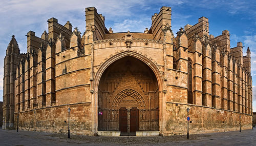 Exterior of historic building against sky