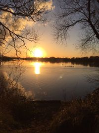 Scenic view of lake during sunset