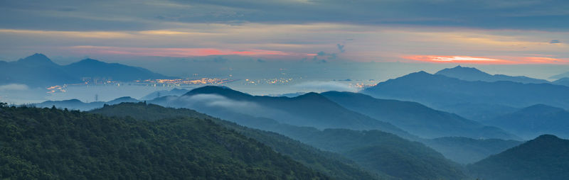Scenic view of mountains against sky during sunset