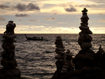 Scenic view of sea against sky at sunset