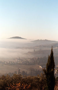 Scenic view of landscape with mountain range in background