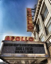 Low angle view of text on building