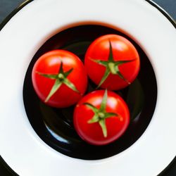 High angle view of cherries in bowl