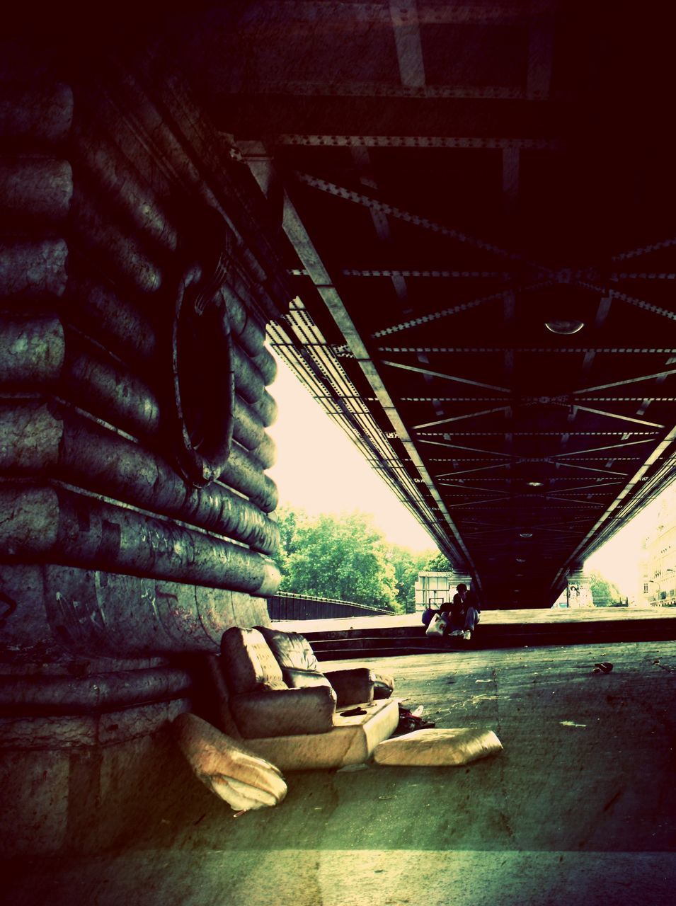 architecture, built structure, low angle view, building exterior, history, arch, old, steps, bridge - man made structure, metal, sunlight, day, railing, no people, outdoors, steps and staircases, famous place, architectural feature, stone material, travel destinations