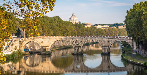 Bridge over river against sky