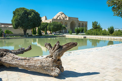 View of historic building by lake