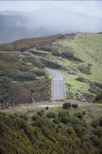 High angle view of road amidst landscape against sky