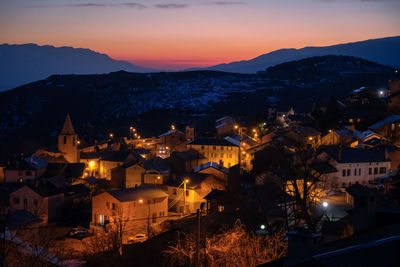 High angle view of townscape against sky at sunset