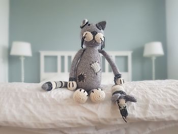 Close-up of stuffed toy on bed