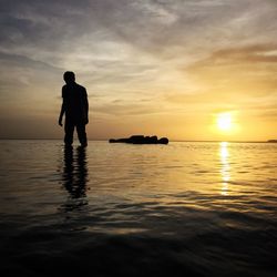 Scenic view of sea at sunset