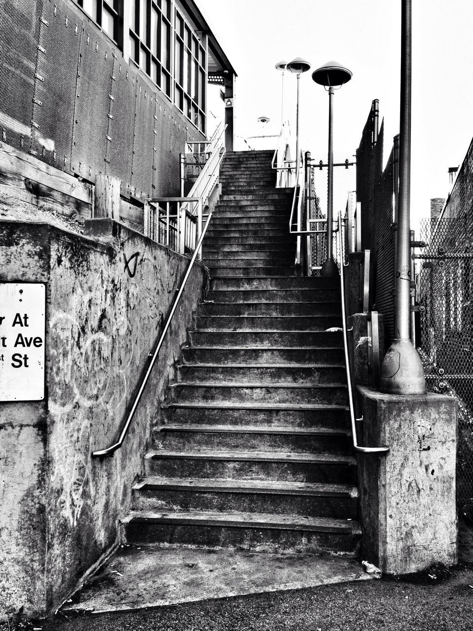 steps, architecture, built structure, steps and staircases, building exterior, staircase, the way forward, railing, wall - building feature, low angle view, stairs, house, building, brick wall, day, no people, residential structure, outdoors, old, diminishing perspective