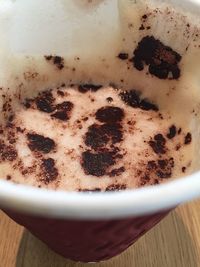 Close-up of coffee cup on table