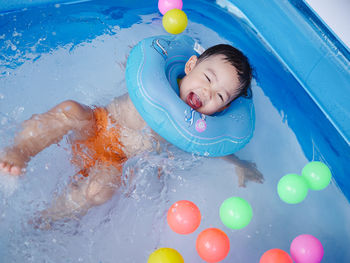 High angle view of boy in swimming pool