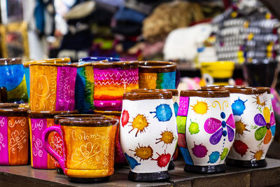Close-up of various objects for sale at market stall