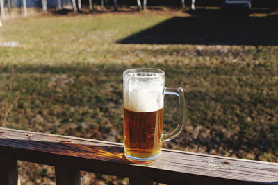 Close-up of beer glass on table