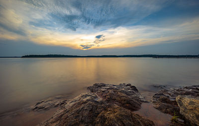 Scenic view of sea against sky during sunset