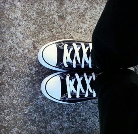 shoe, low section, person, high angle view, footwear, indoors, close-up, sunlight, standing, shadow, day, human foot, personal perspective, street, pair, canvas shoe, part of