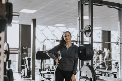 Woman standing in gym