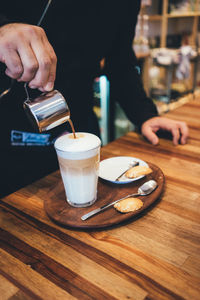 Close-up of coffee cup on table