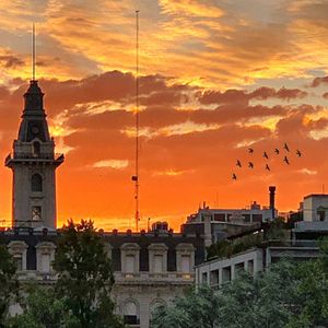 Buildings against sky during sunset