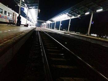 Railroad tracks at night