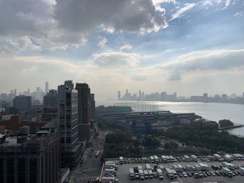 High angle view of buildings in city against sky