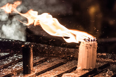 Close-up of burning candles