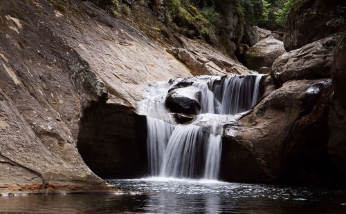 View of waterfall in forest