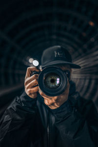 Portrait of man photographing