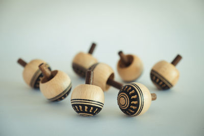 Close-up of objects on table against white background