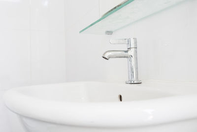 Close-up of sink in bathroom