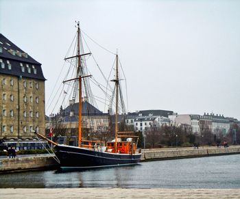 Tall ship moored in river