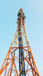 Low angle view of communications tower against sky