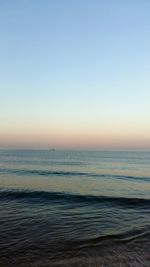 Scenic view of sea at sunset