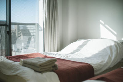 Man relaxing on bed at home