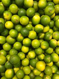 Full frame shot of limes for sale at market stall